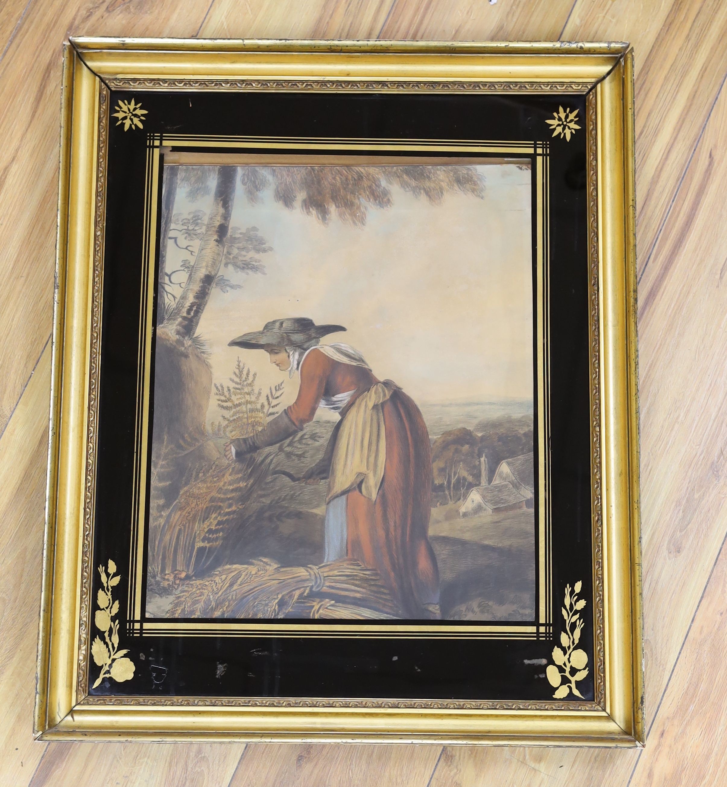 Early 19th century English School, hand coloured lithograph, Woman harvesting bracken, eglomise framed, 43 x 34cm